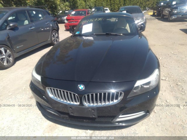 Photo 5 VIN: WBALM7C55BE383048 - BMW Z4 