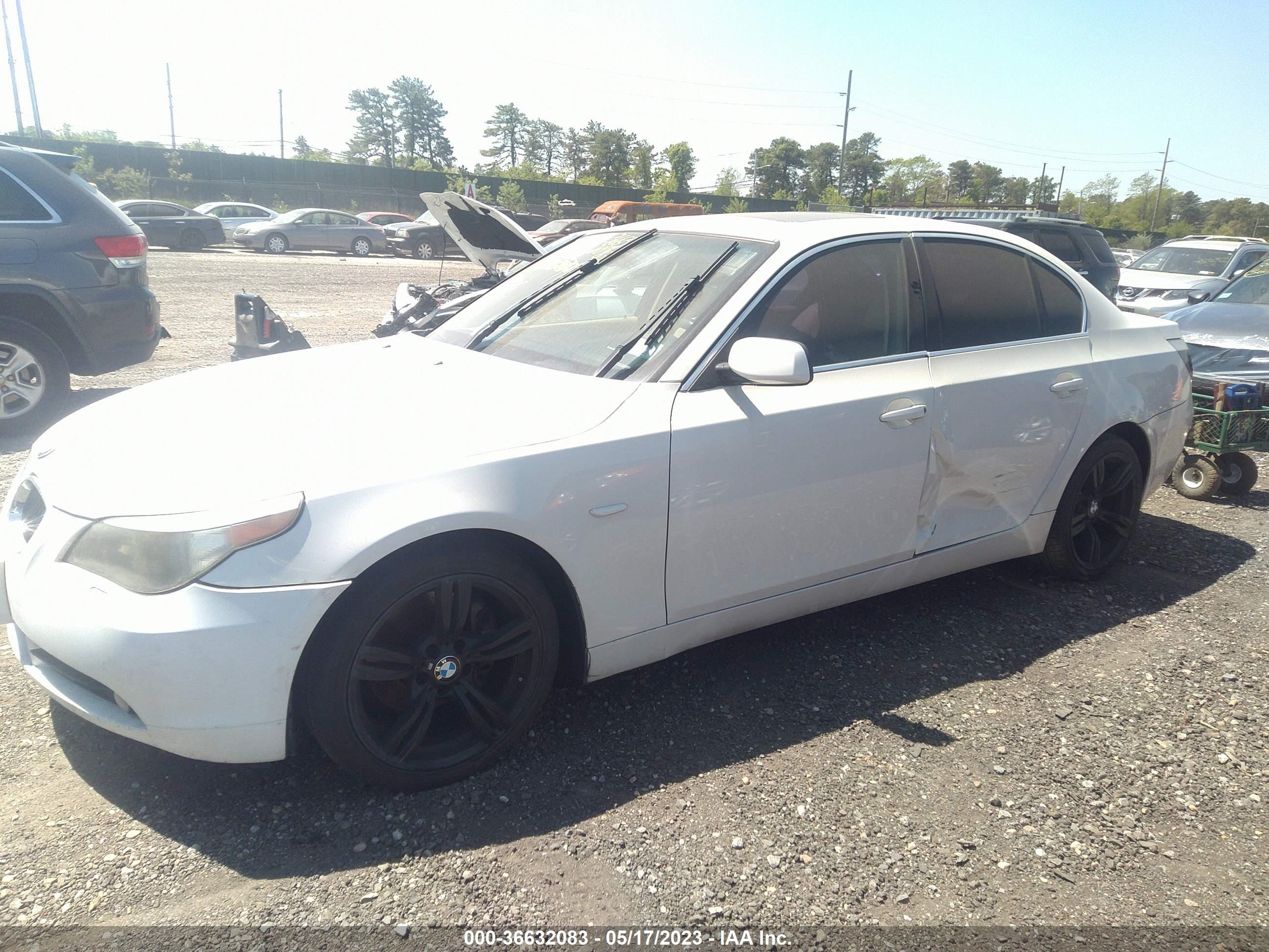 Photo 1 VIN: WBANE535X6CK85600 - BMW 5ER 