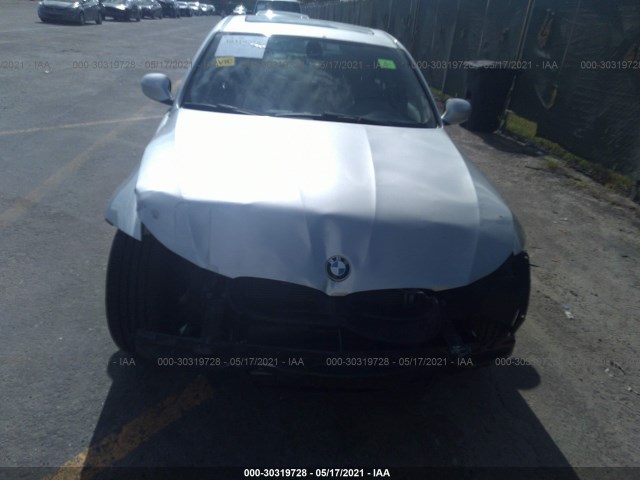 Photo 5 VIN: WBAPH7C59BE675517 - BMW 3 