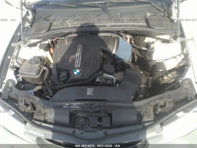 Photo 9 VIN: WBAUC9C51CVM12811 - BMW 1 