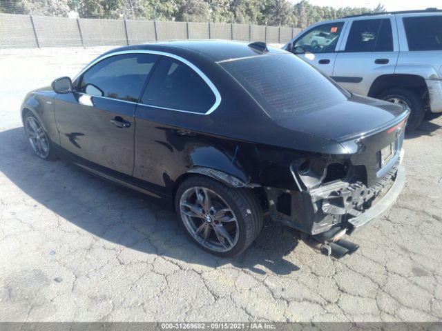 Photo 2 VIN: WBAUC9C54DVY60610 - BMW 1 