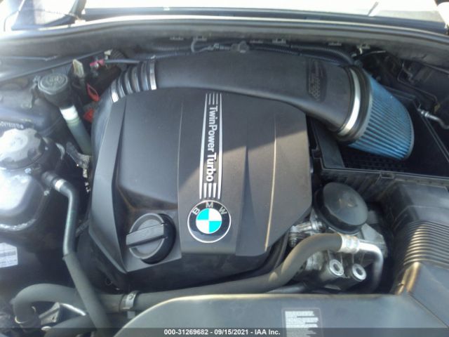 Photo 9 VIN: WBAUC9C54DVY60610 - BMW 1 