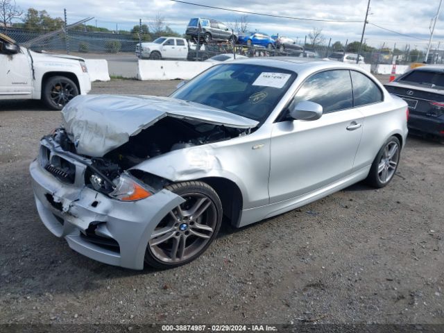 Photo 1 VIN: WBAUC9C55BVM10509 - BMW 135I 