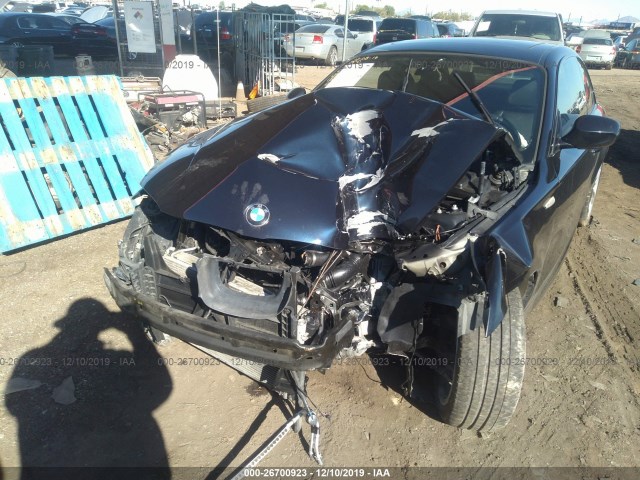 Photo 5 VIN: WBAUC9C57DVY60651 - BMW 1 