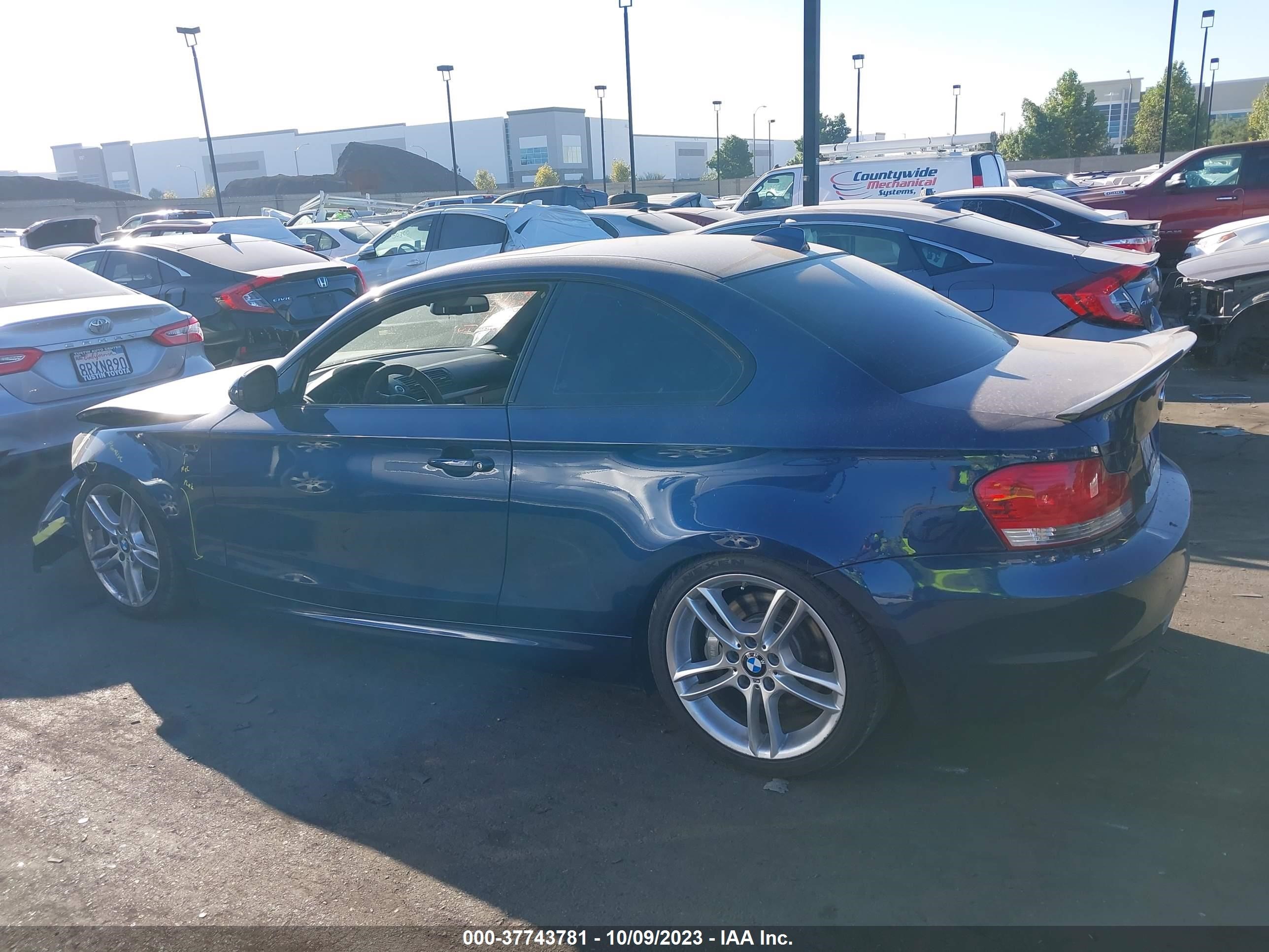 Photo 13 VIN: WBAUC9C58BVM09838 - BMW 1ER 