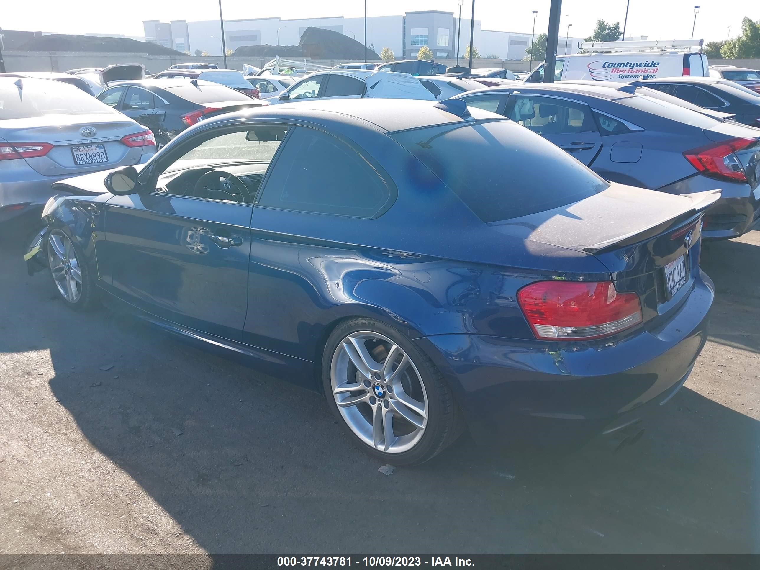 Photo 2 VIN: WBAUC9C58BVM09838 - BMW 1ER 