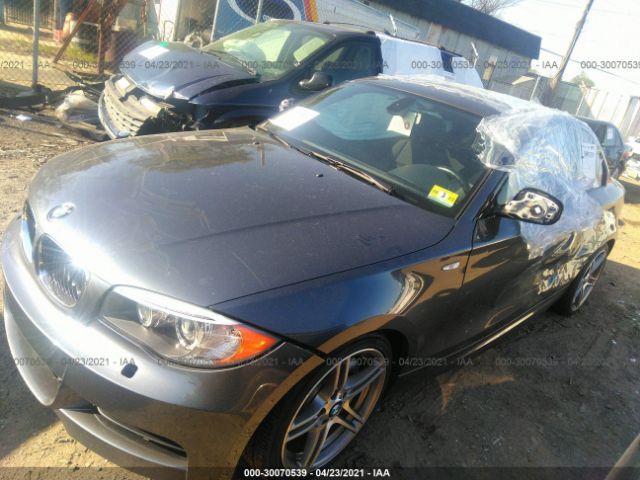 Photo 1 VIN: WBAUC9C59DVY60277 - BMW 1 