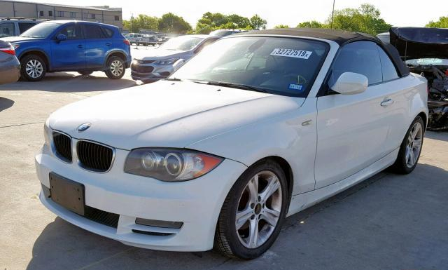 Photo 1 VIN: WBAUL7C56AVJ77453 - BMW 128 