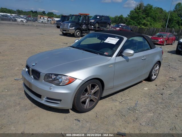 Photo 1 VIN: WBAUL7C56AVJ78019 - BMW 128I 