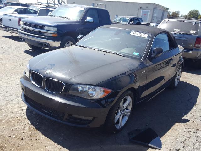 Photo 1 VIN: WBAUL7C57AVE86836 - BMW 128 I 