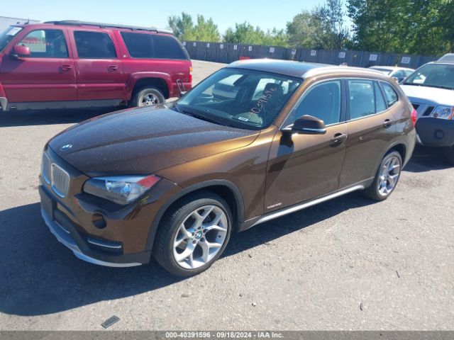 Photo 1 VIN: WBAVL1C52FVY25542 - BMW X1 