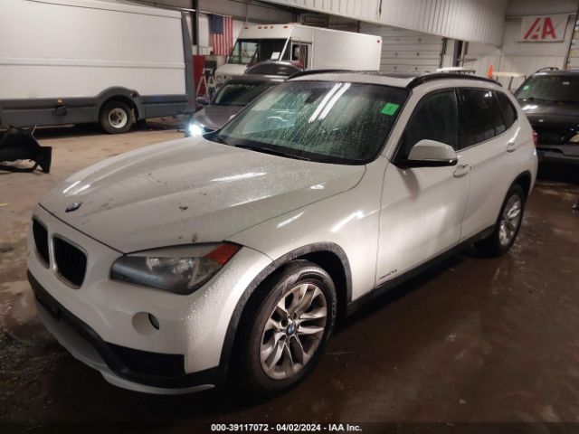 Photo 1 VIN: WBAVL1C52FVY33138 - BMW X1 