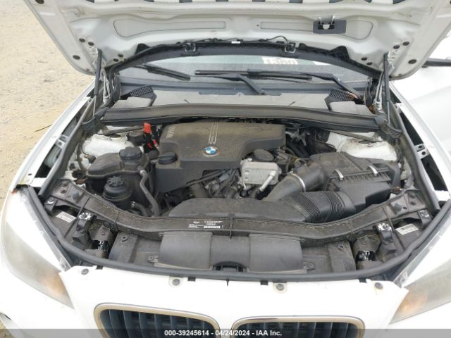 Photo 9 VIN: WBAVL1C54EVY18963 - BMW X1 