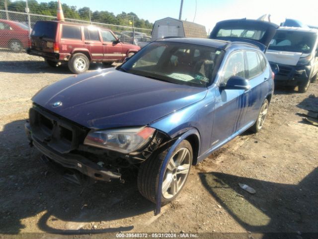 Photo 1 VIN: WBAVL1C58FVY30292 - BMW X1 