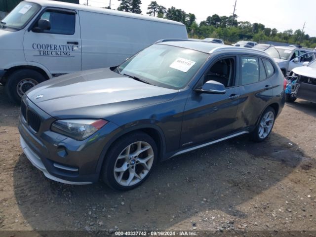 Photo 1 VIN: WBAVL1C58FVY40028 - BMW X1 