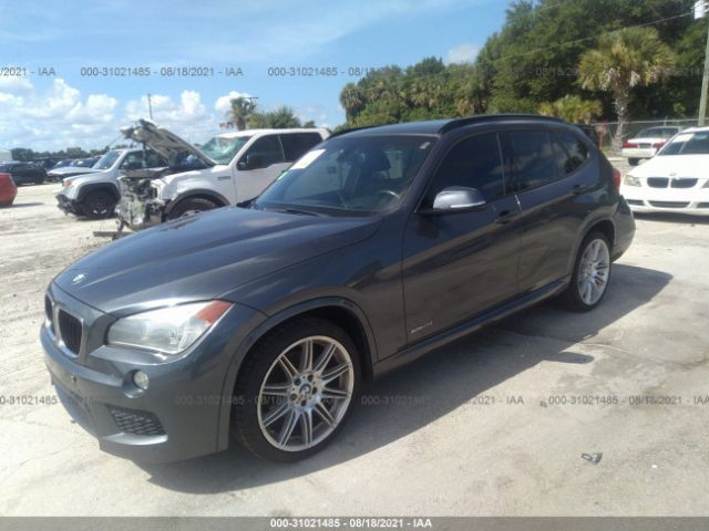 Photo 1 VIN: WBAVL1C59EVY12012 - BMW X1 