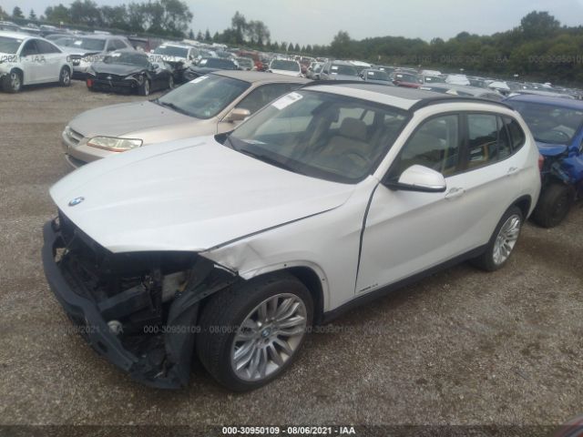 Photo 1 VIN: WBAVL1C5XEVY13637 - BMW X1 