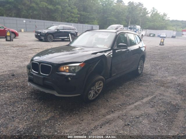 Photo 1 VIN: WBAVL1C5XFVY26888 - BMW X1 