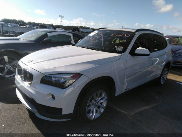 Photo 1 VIN: WBAVL1C5XFVY27815 - BMW X1 