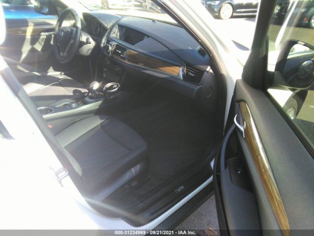 Photo 4 VIN: WBAVL1C5XFVY27815 - BMW X1 