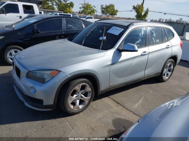 Photo 1 VIN: WBAVM1C50FV315381 - BMW X1 