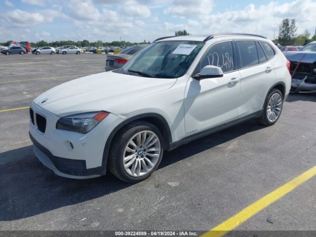 Photo 1 VIN: WBAVM1C51FV317365 - BMW X1 