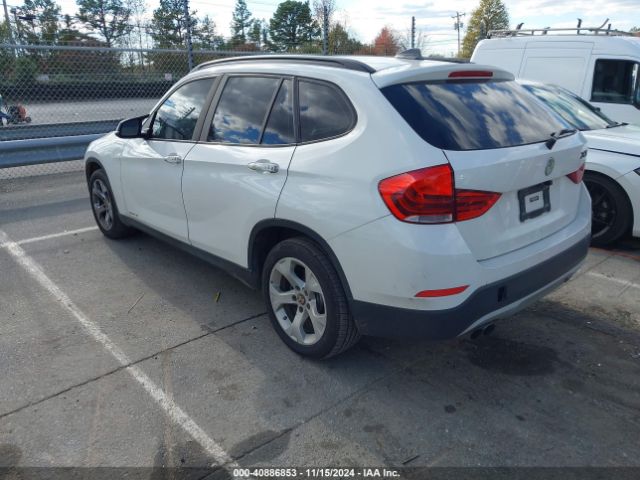 Photo 2 VIN: WBAVM1C51FV498256 - BMW X1 