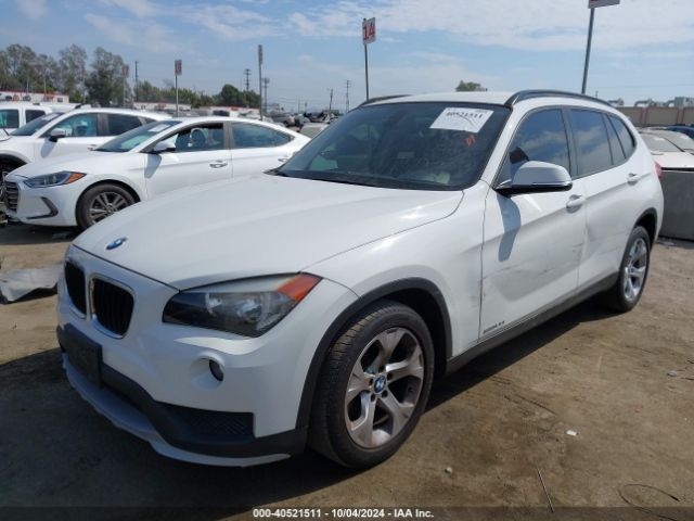 Photo 1 VIN: WBAVM1C51FVZ93699 - BMW X1 