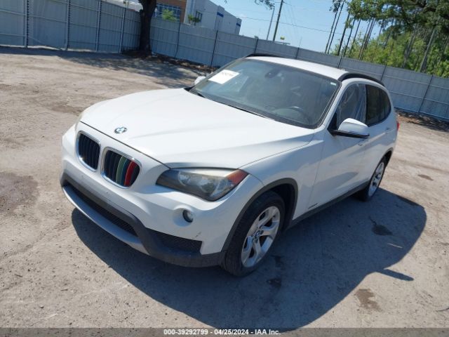 Photo 1 VIN: WBAVM1C52EVW47580 - BMW X1 