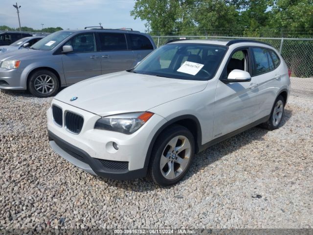 Photo 1 VIN: WBAVM1C52EVW48972 - BMW X1 