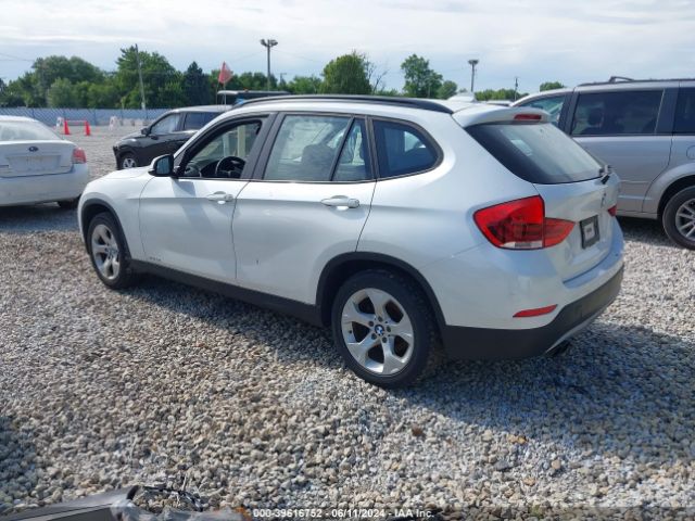 Photo 2 VIN: WBAVM1C52EVW48972 - BMW X1 