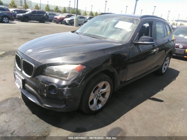 Photo 1 VIN: WBAVM1C52EVW53945 - BMW X1 