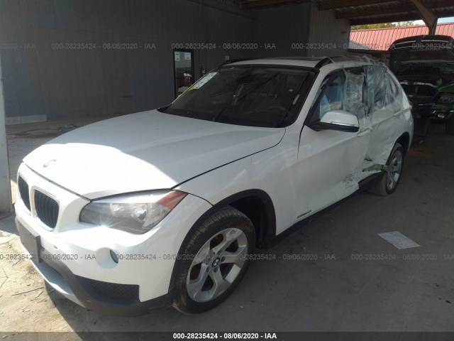 Photo 1 VIN: WBAVM1C53EVW51606 - BMW X1 