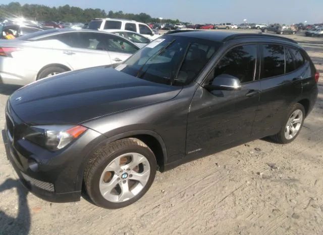 Photo 1 VIN: WBAVM1C53EVW52870 - BMW X1 