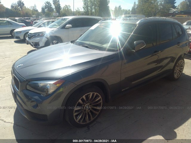 Photo 1 VIN: WBAVM1C53EVW56532 - BMW X1 