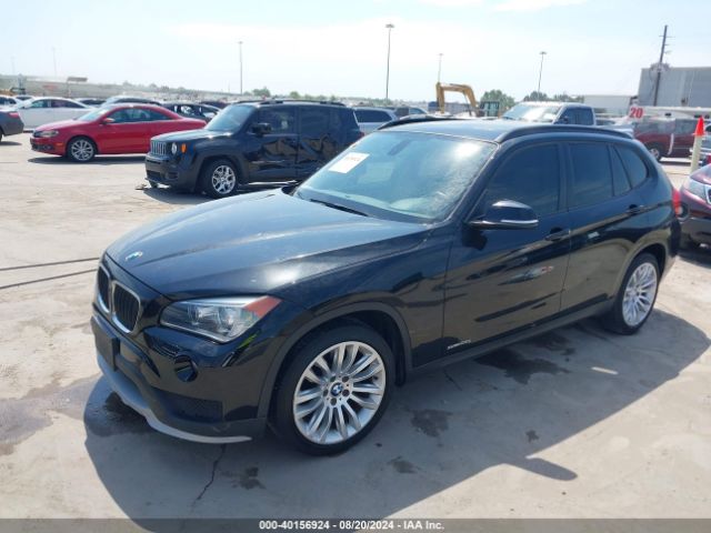 Photo 1 VIN: WBAVM1C53FV315603 - BMW X1 