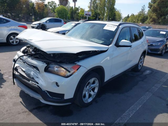 Photo 1 VIN: WBAVM1C53FV316427 - BMW X1 