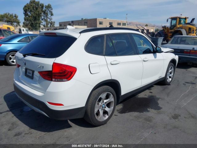 Photo 3 VIN: WBAVM1C53FV316427 - BMW X1 