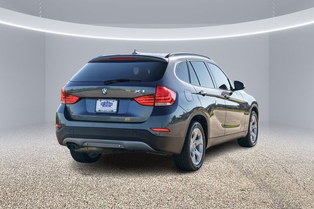 Photo 8 VIN: WBAVM1C53FV318436 - BMW X1 