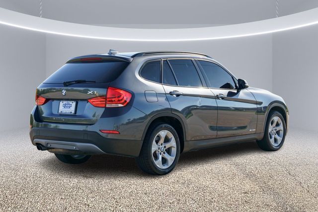 Photo 9 VIN: WBAVM1C53FV318436 - BMW X1 