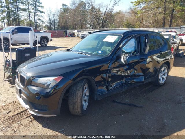 Photo 1 VIN: WBAVM1C53FV498940 - BMW X1 