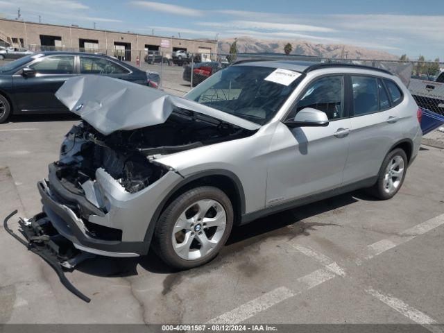 Photo 1 VIN: WBAVM1C53FVW58301 - BMW X1 