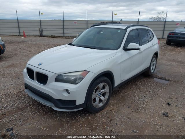 Photo 1 VIN: WBAVM1C53FVZ93638 - BMW X1 