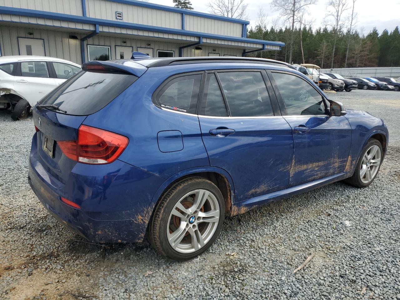 Photo 2 VIN: WBAVM1C54EVW46950 - BMW X1 