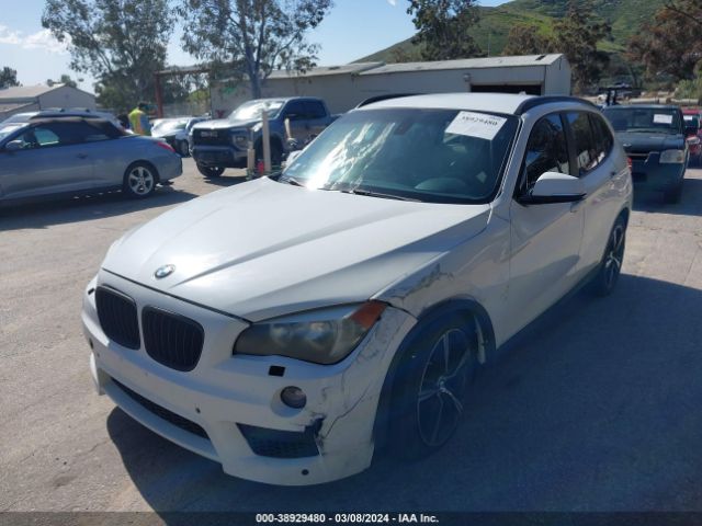 Photo 1 VIN: WBAVM1C54EVW47631 - BMW X1 