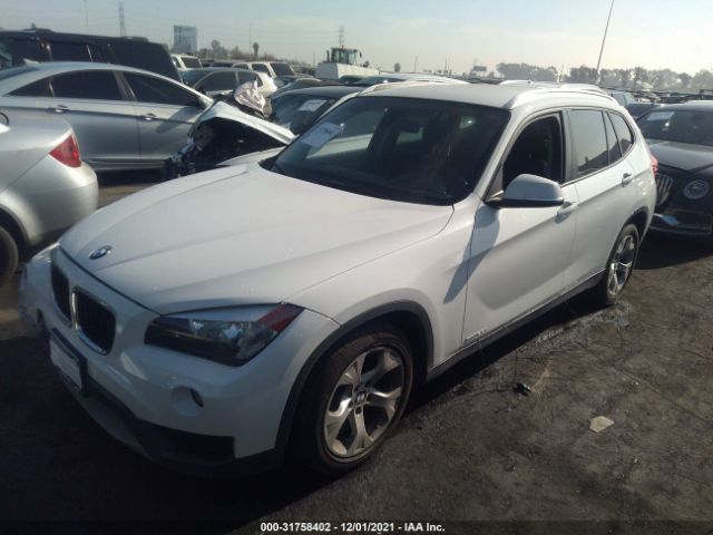 Photo 1 VIN: WBAVM1C54EVW56653 - BMW X1 