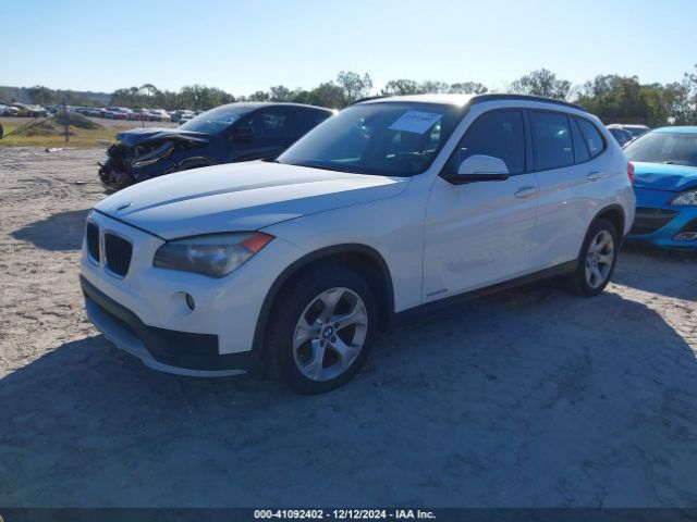 Photo 1 VIN: WBAVM1C54FV316467 - BMW X1 