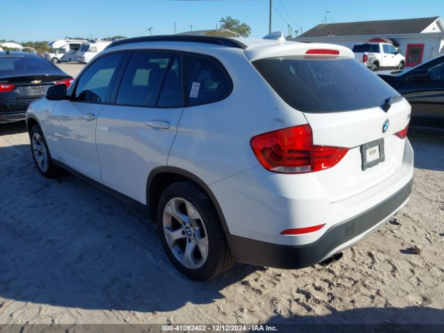 Photo 2 VIN: WBAVM1C54FV316467 - BMW X1 