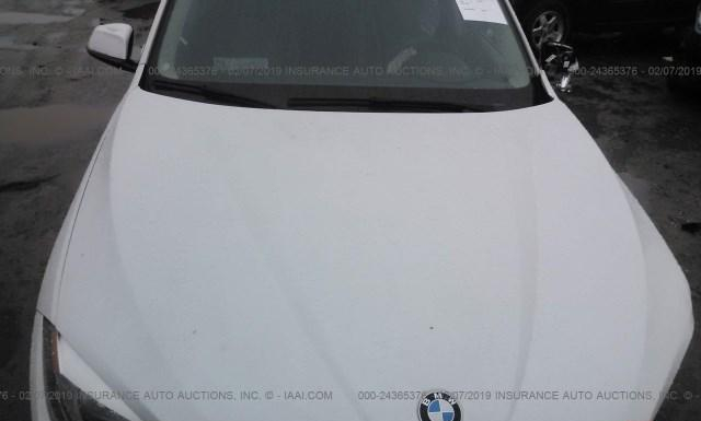 Photo 9 VIN: WBAVM1C54FVW57464 - BMW X1 