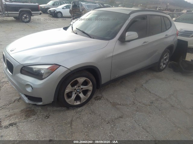 Photo 1 VIN: WBAVM1C55EVW49677 - BMW X1 